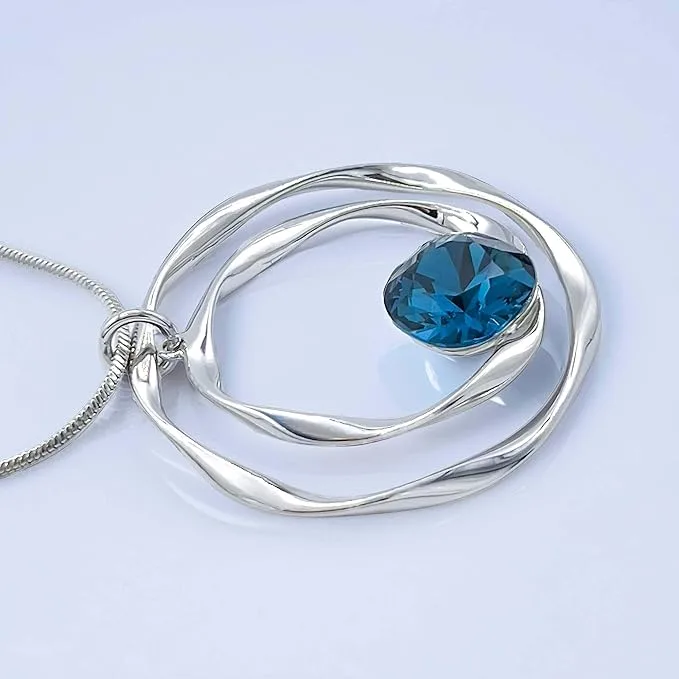 Collier pendentif argenté cercle ajouré pierre bleue ClawMeUp