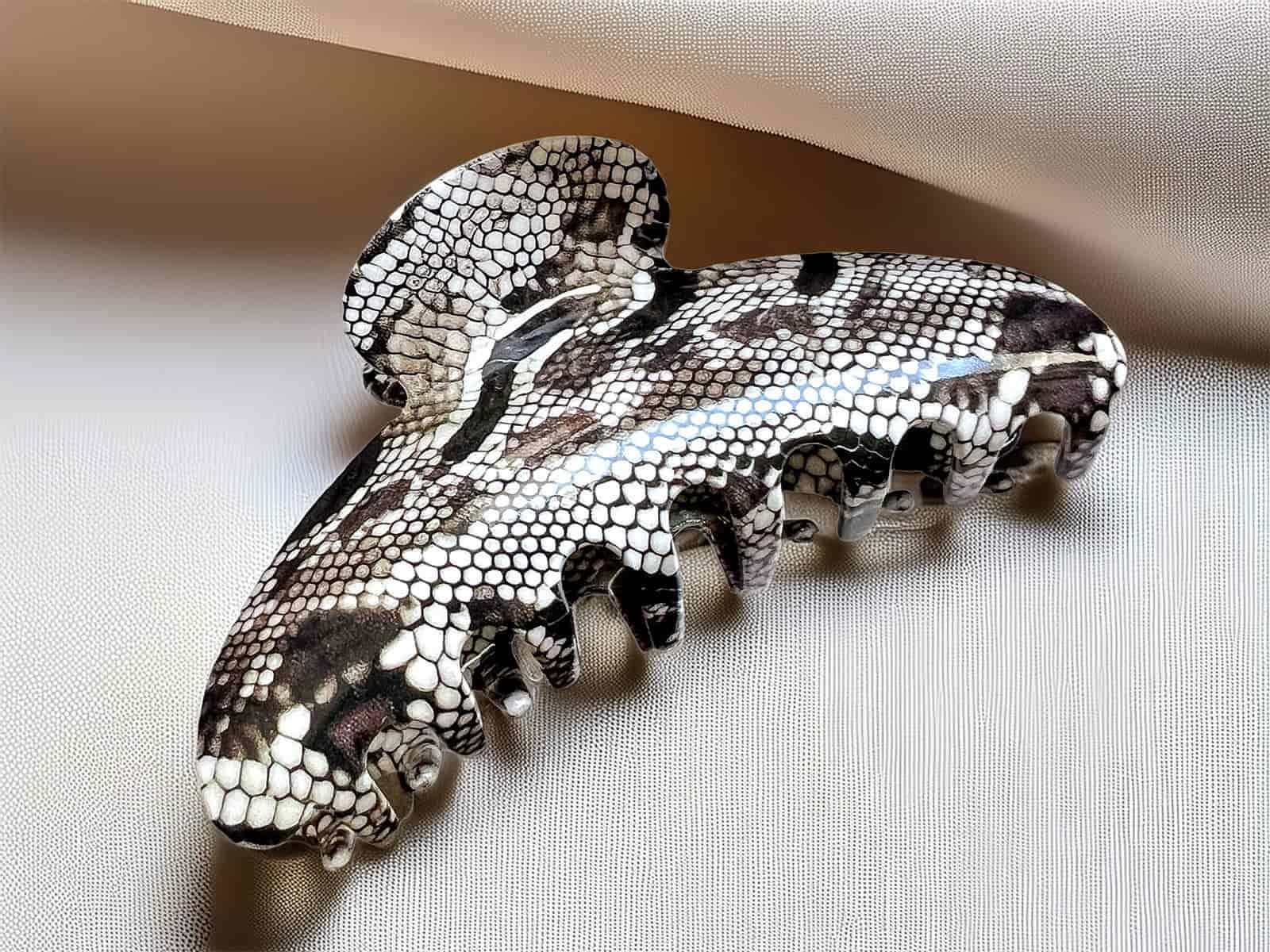 Mécanisme solide d'une pince à cheveux ClawMeUp