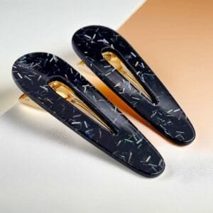 Duo pinces à cheveux plates ovales acétate noir holographique mécanisme doré — ClawMeUp
