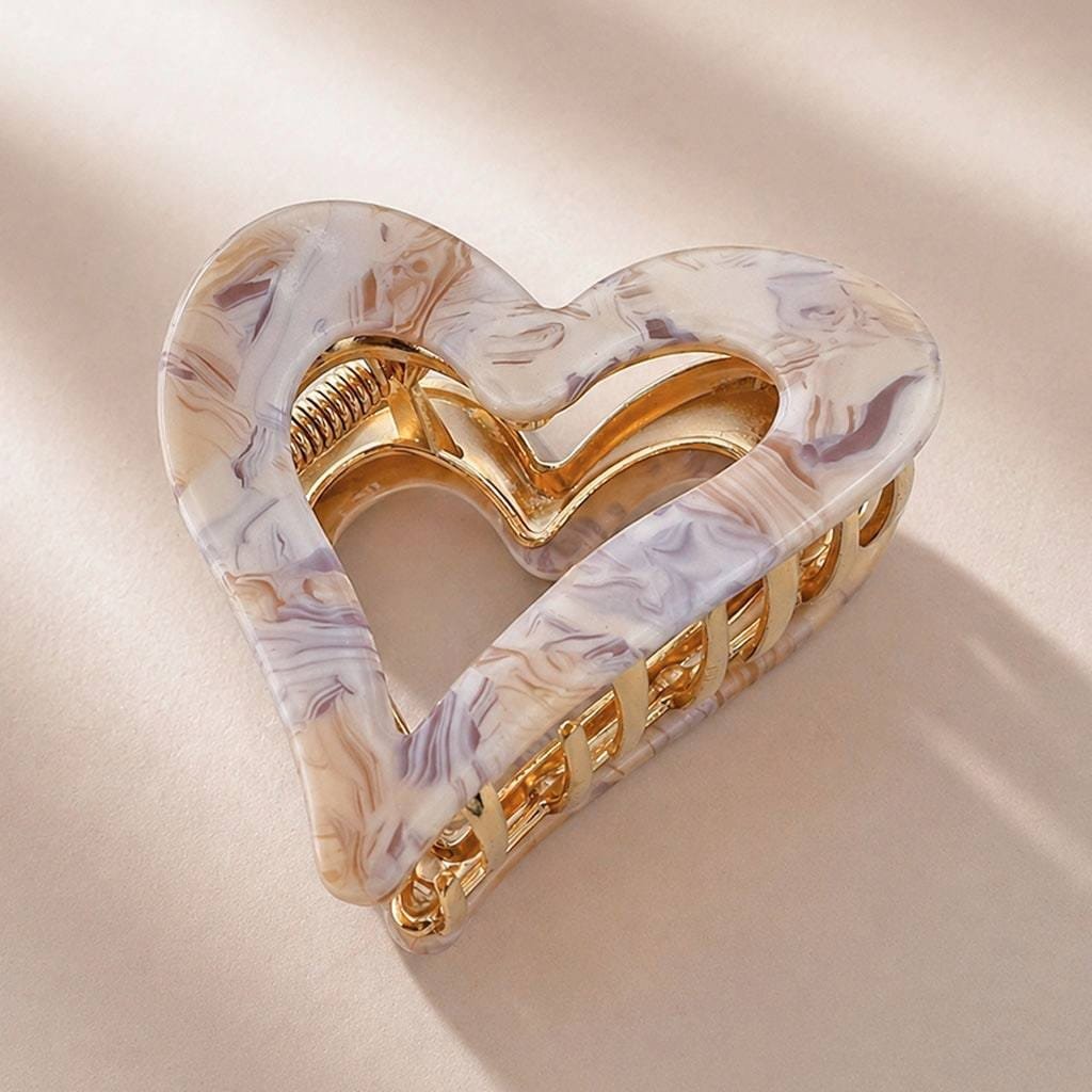 Pince à cheveux cœur ajouré acétate