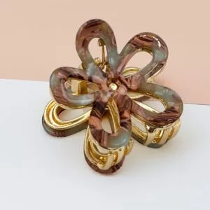 Pince à cheveux fleur ajourée acétate soleil et ocre marbré monture dorée — ClawMeUp