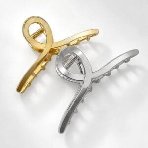 Duo de petites pinces à cheveux métal finition Dorée et Argentée, design boucle, ressort et dents visibles — ClawMeUp Paris