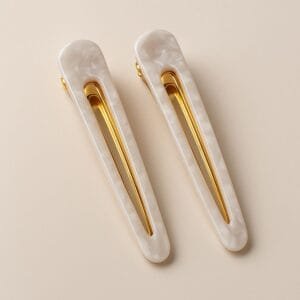Duo de barrettes plates spatule dorées en acétate blanc nacré