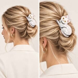 Barrette cheveux chat blanc nacré portée sur un chignon, vue de profil — ClawMeUp